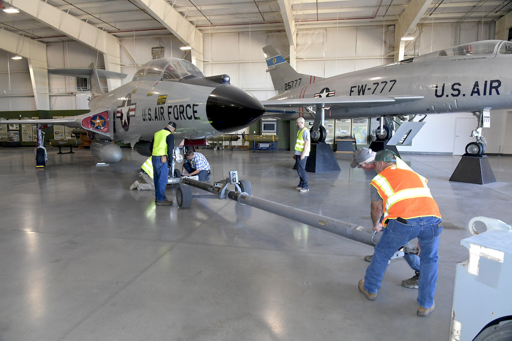 Crews prepare to relocate an F 101 Voodoo static display at the Hill Aerospace Museum