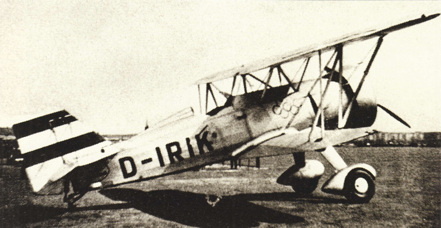 Curtiss Hawk II D IRIK adorned with the Olympic rings and the old Imperial colors of Germany from 1870 to 1918 German Aviation History Working Group