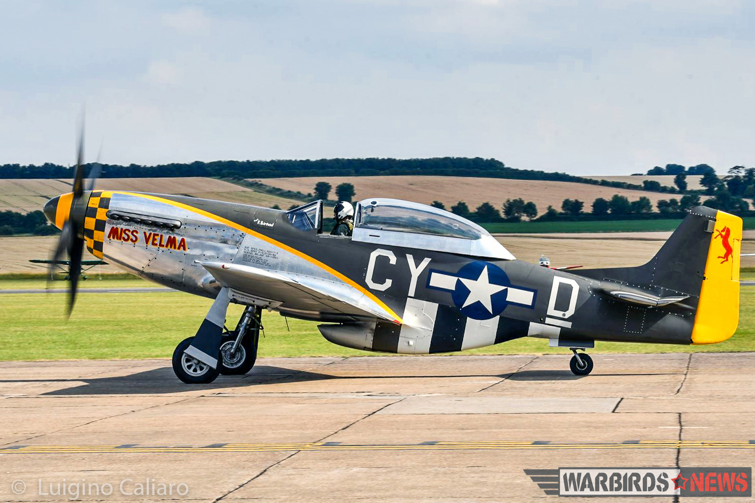 The ill-fated P-51D 'Miss Velma' taxies out for takeoff before the Balbo. As these words were written, the Mustang was already back at Duxford, on its gear, undergoing damage assessment. (photo by Luigino Caliaro)