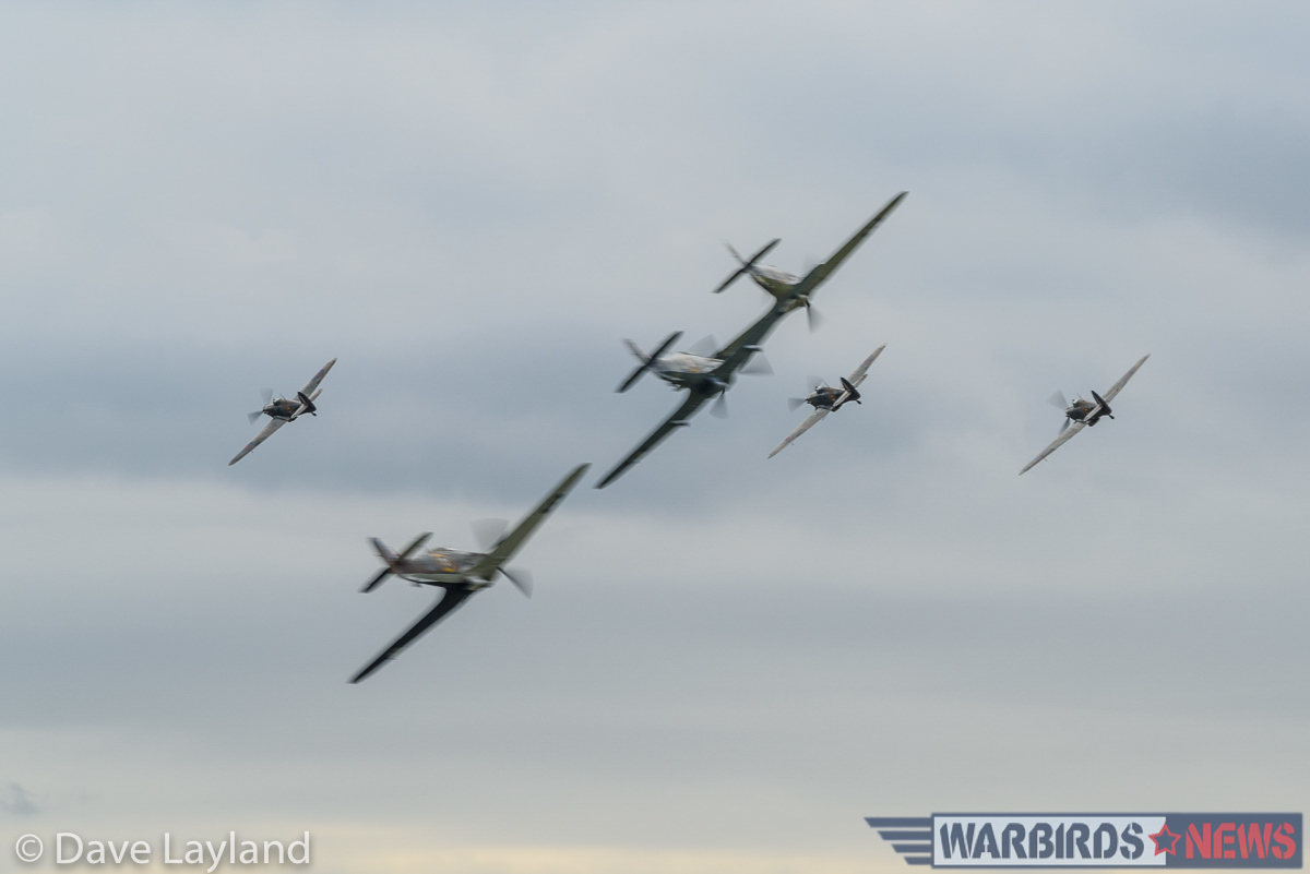 Six Hurricanes perform a tail chase. This sight has probably not been seen since the end of WWII. (photo by Dave Layland)