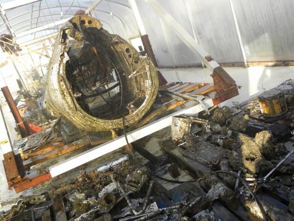 Another image showing how the Dornier's components are continually bathed in a fine spray of mild citric acid solution in the desalination tent at RAF Museum Cosford. The solution also helps remove corrosion from the surviving aluminium.(photo credit: © Trustees of the Royal Air Force Museum 2014)
