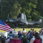 Douglas AD 4 Skyraider Salutes the Flag during the Flying Proms