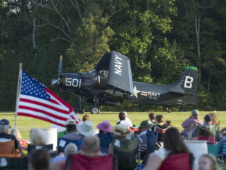 Douglas AD 4 Skyraider Salutes the Flag during the Flying Proms
