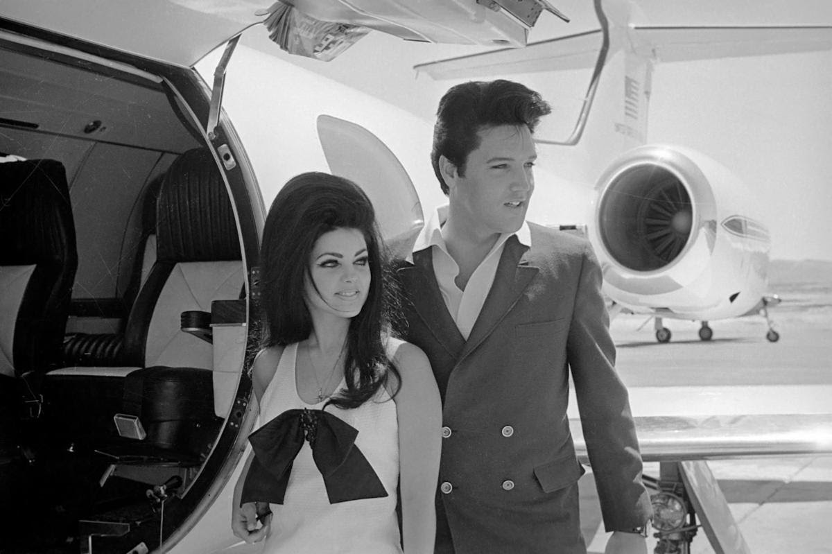 Elvis and Priscilla on their wedding day with Sinatras Learjet.