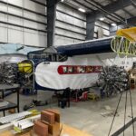 Engines 1 left and 2 center mounted on NC9684. Note the yellow oil tank installed behind engine 2 THF s Port Clinton Ford Tri Motor Restoration