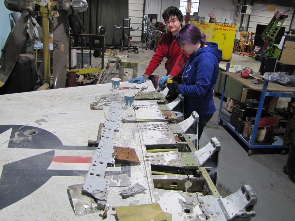 F 104 Repair of the F 104s left wing is in progress and top photo.