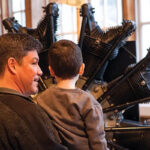 Father and son in The Museum of Flight Red Barn. Ted Huetter The Museum of Flight