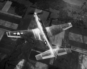 Fisher P 75A Eagle 44 44550 in flight showing the differences between the XP 75 and the P 75A with an enlarged square tail larger squared wings and a bubble top canopy US Air Force photo