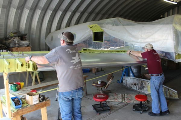 Paul and Randall test fitting the leading edge skin on the right-hand outer wing panel. (photo via Tom Reilly)