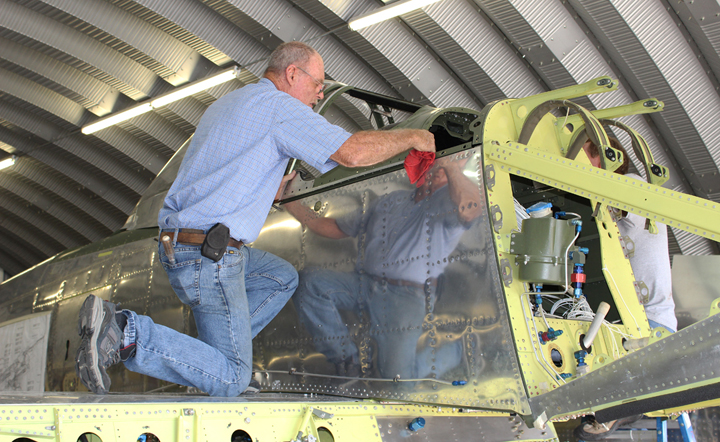 Tom Reilly and another engineer fitting the left hand windscreen. (photo via Tom Reilly)