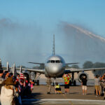 Flags water cannon welcome 22 by Jaime Cordova