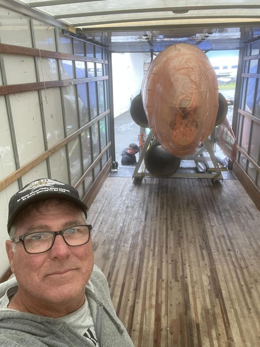 Greg Stathatos taking a selfie with the TV 1 forward fuselage being loaded into the rented box truck at Paine Field Greg Stathatos B 17 Archaeology 1