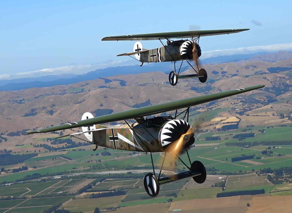 TVAL's two Fokker D.VIII reproductions in flight. [Photo by Historical Aviation Film Unit]