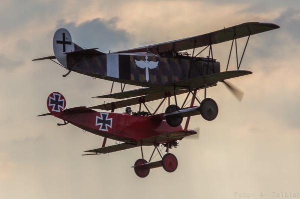 Fokker Albatros D.VII and Fokker Dr.I triplane demonstrate the capabilities of WW I aircraft. (Image Credit: Andreas Zeitler)