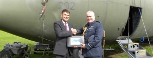  RAF Museum Director, Peter Dye receives XV202's Service log from Air Marshal Baz North of the Royal Air Force. (Image Credit: RAF Museum)