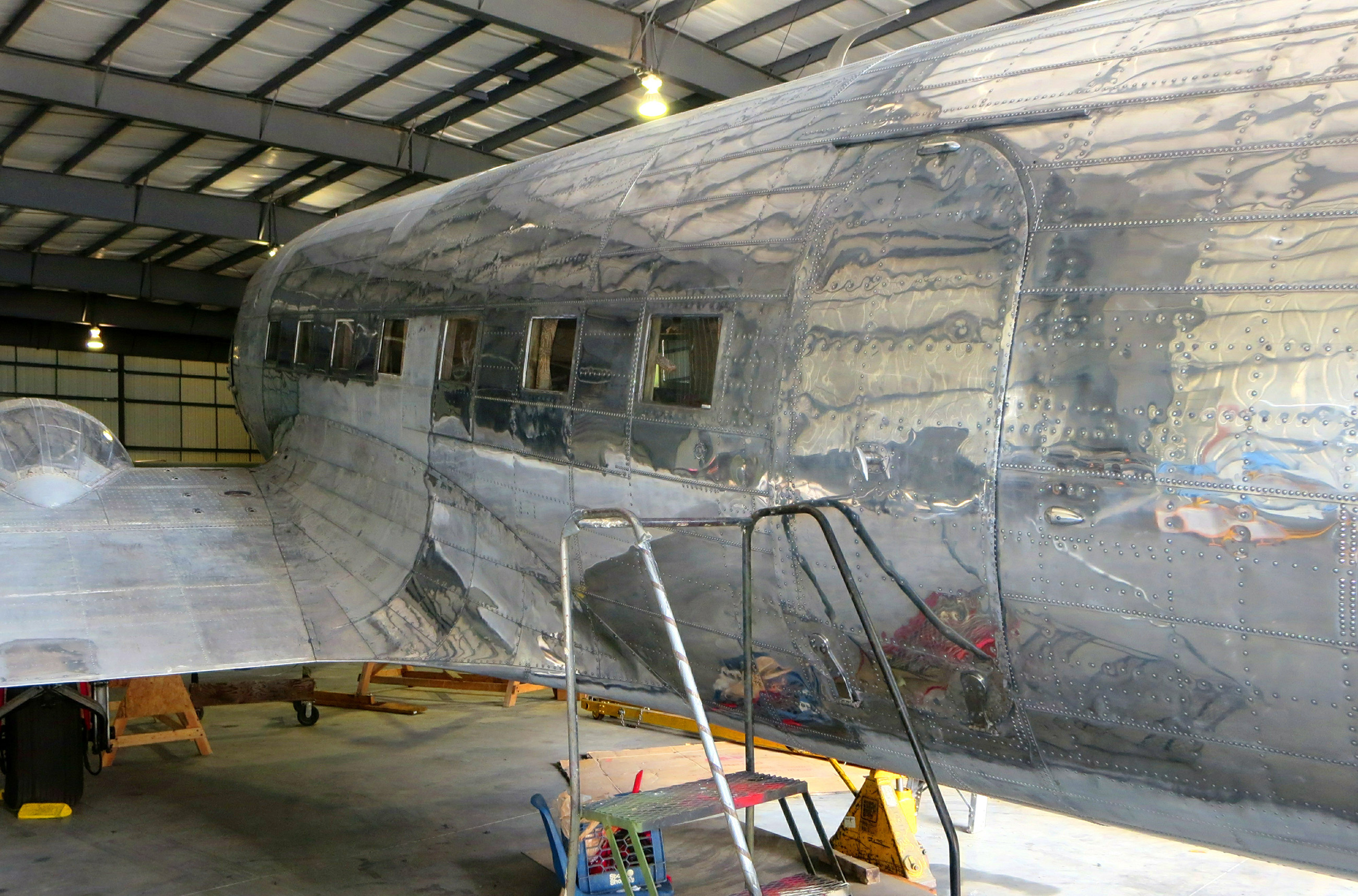 The fuselage is now well into the polishing process, and it's clear that the end results will be breathtakingly beautiful. (photo via NEAM)