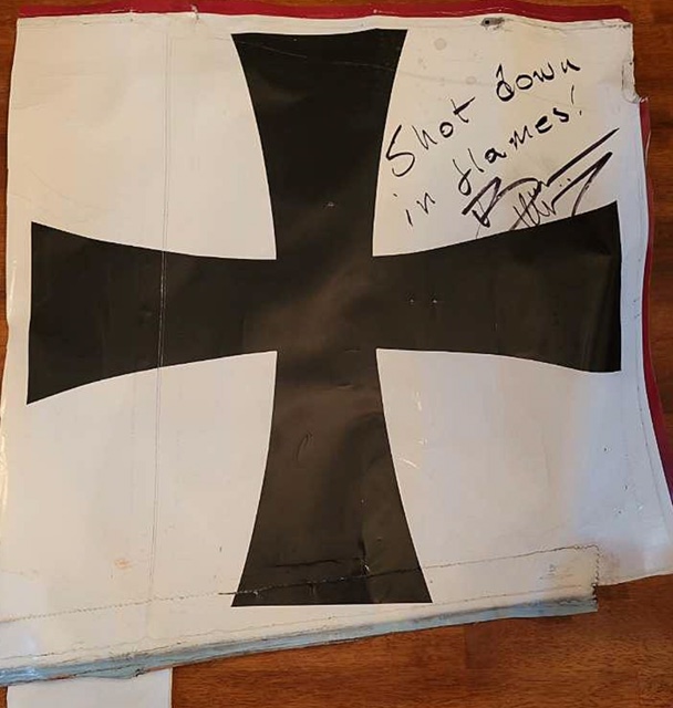 The piece of Fokker fabric signed by Bruce Dickinson, the winner of which will be announced at the Gala. [Photo via Old Rhinebeck Aerodrome]