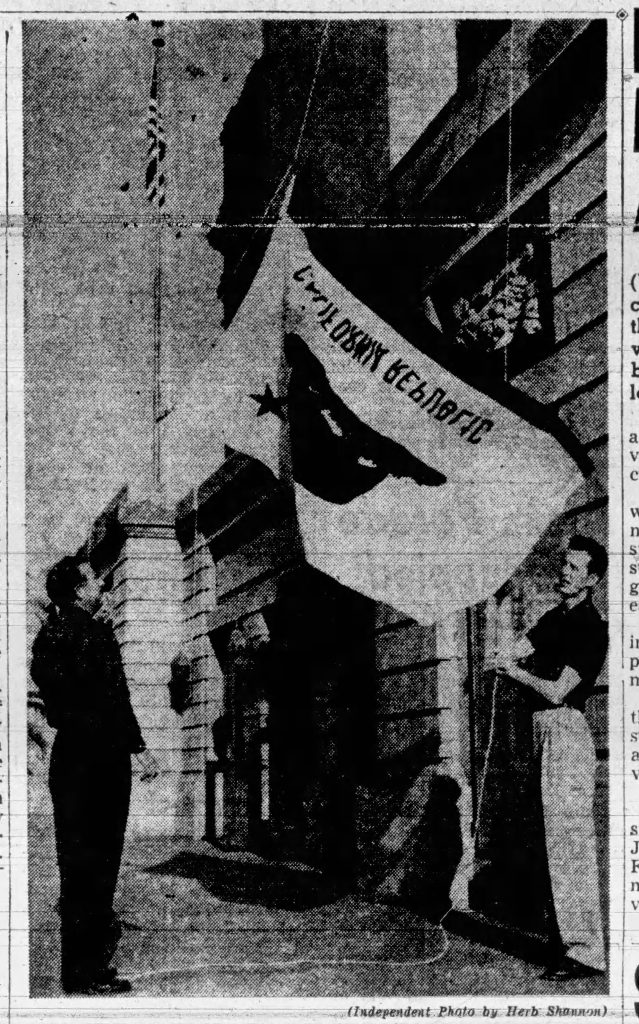 C-47 "That's All, Brother" - The Men Behind the Plane 18 John Shallcross fixes upside down flag the Independent May 1952