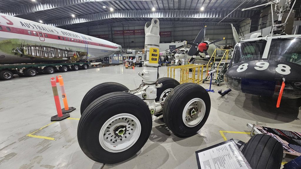 John Travolta’s Former Boeing 707 Arrives at Australia’s HARS Aviation Museum 10 John Travoltas Former Boeing 707 Arrives at Australias HARS Aviation Museum main landing gear