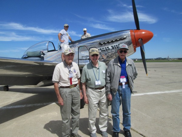 "Pecos Bill" with three happy customers in Kansas: WWII veterans (l-r) Raymond Fary, Clifford Kantz and Lynus Ryan. (photo by Jen Charlton)
