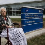 Katherine Johnson in front of the Computational Research Facility named for her.