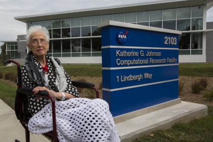 Katherine Johnson in front of the Computational Research Facility named for her.