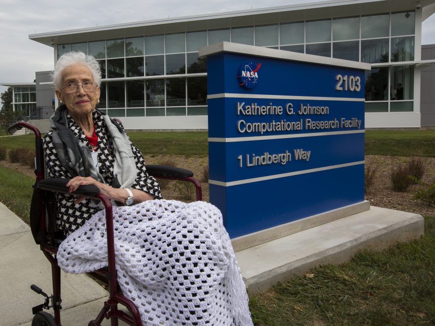 Katherine Johnson in front of the Computational Research Facility named for her.