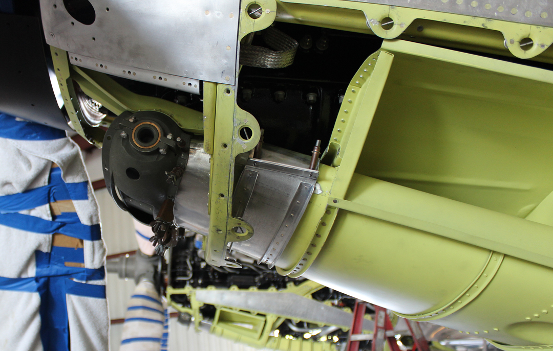 The left hand engine's lower chin cowl to air induction trunk adaptor, seen from the left side. (photo via Tom Reilly)