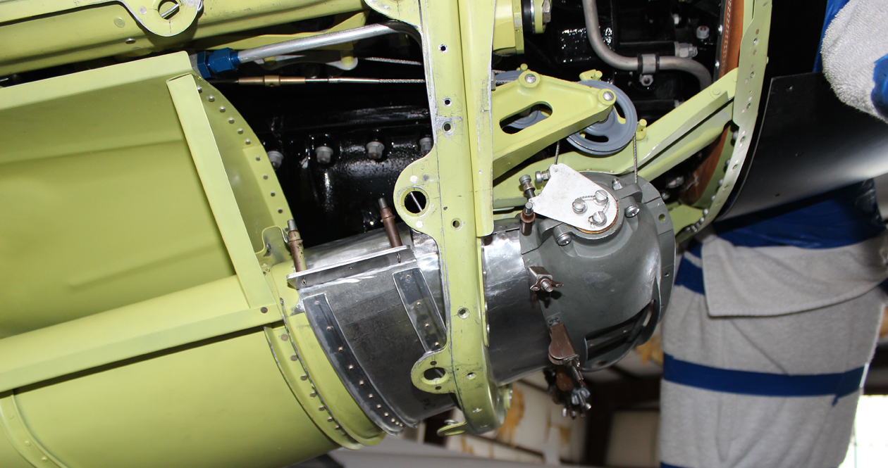 The left hand engine's lower chin cowl to air induction trunk adaptor, seen from the right side. (photo via Tom Reilly)