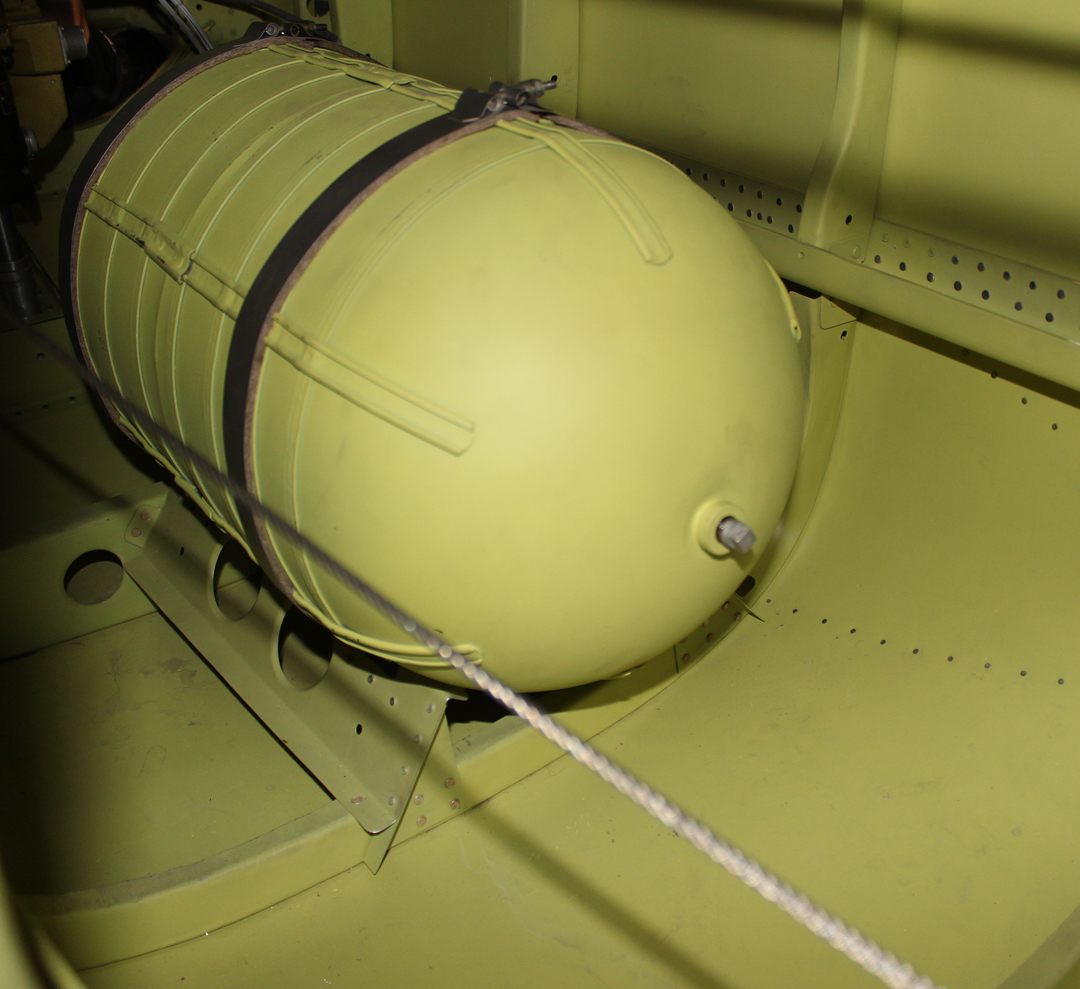 The large oxygen bottle mounted in the lower rear of each fuselage. (photo via Tom Reilly)