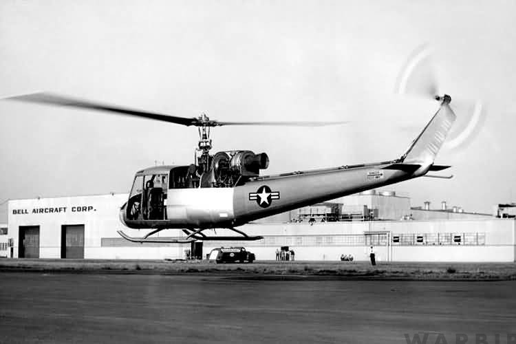 Left rear quarter view of the Bell XH 40 hovering in ground effect at the Bell Aircraft Corporation helicopter plant at Hurst Texas. U.S. Army
