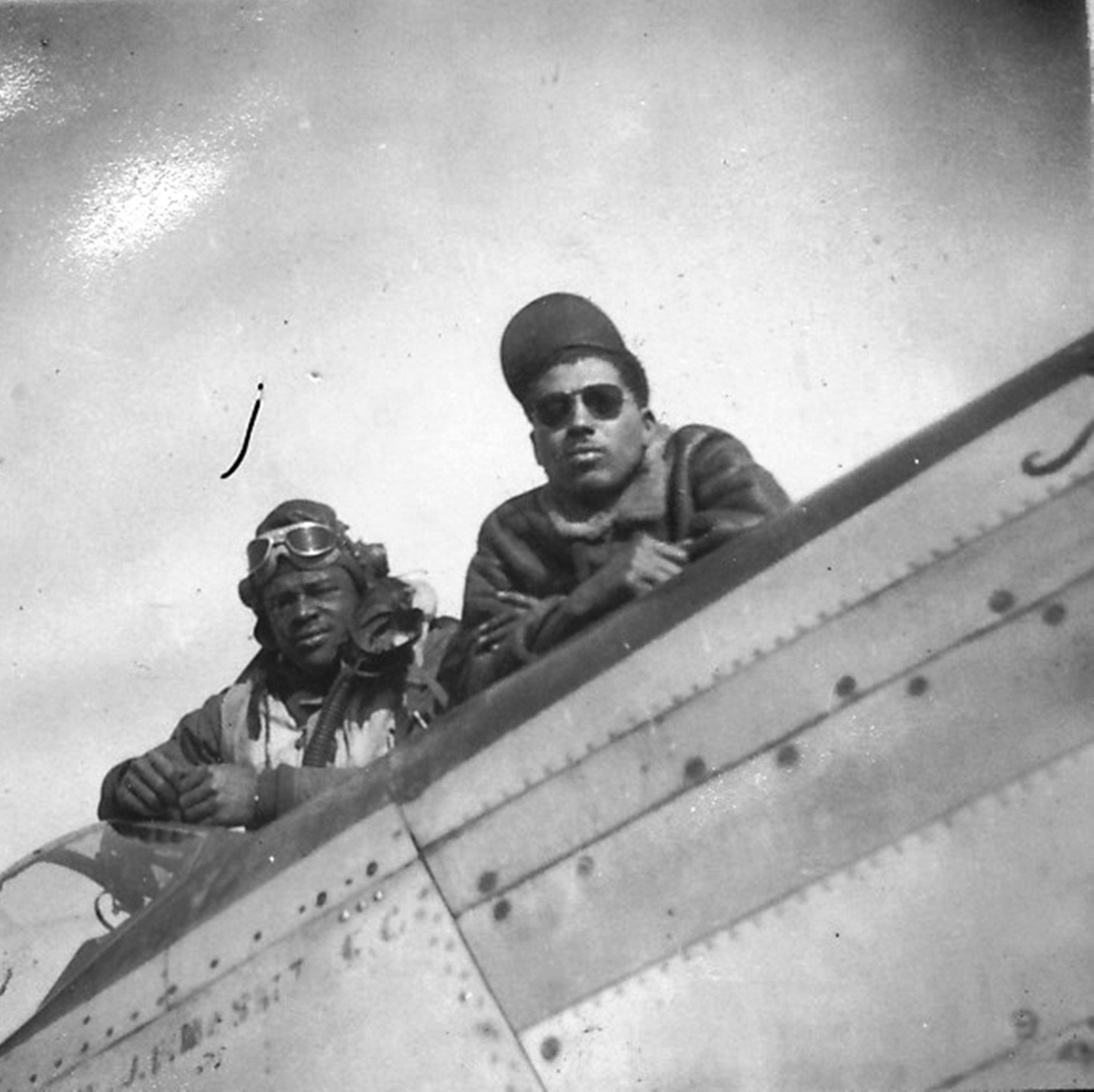 Leland Pennington and Crew Chief w. P 51 Possibly Lucy Gal scaled