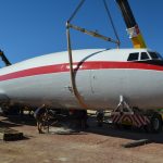 Lifting the fuselage onto stands in preparation for the wings to be attached