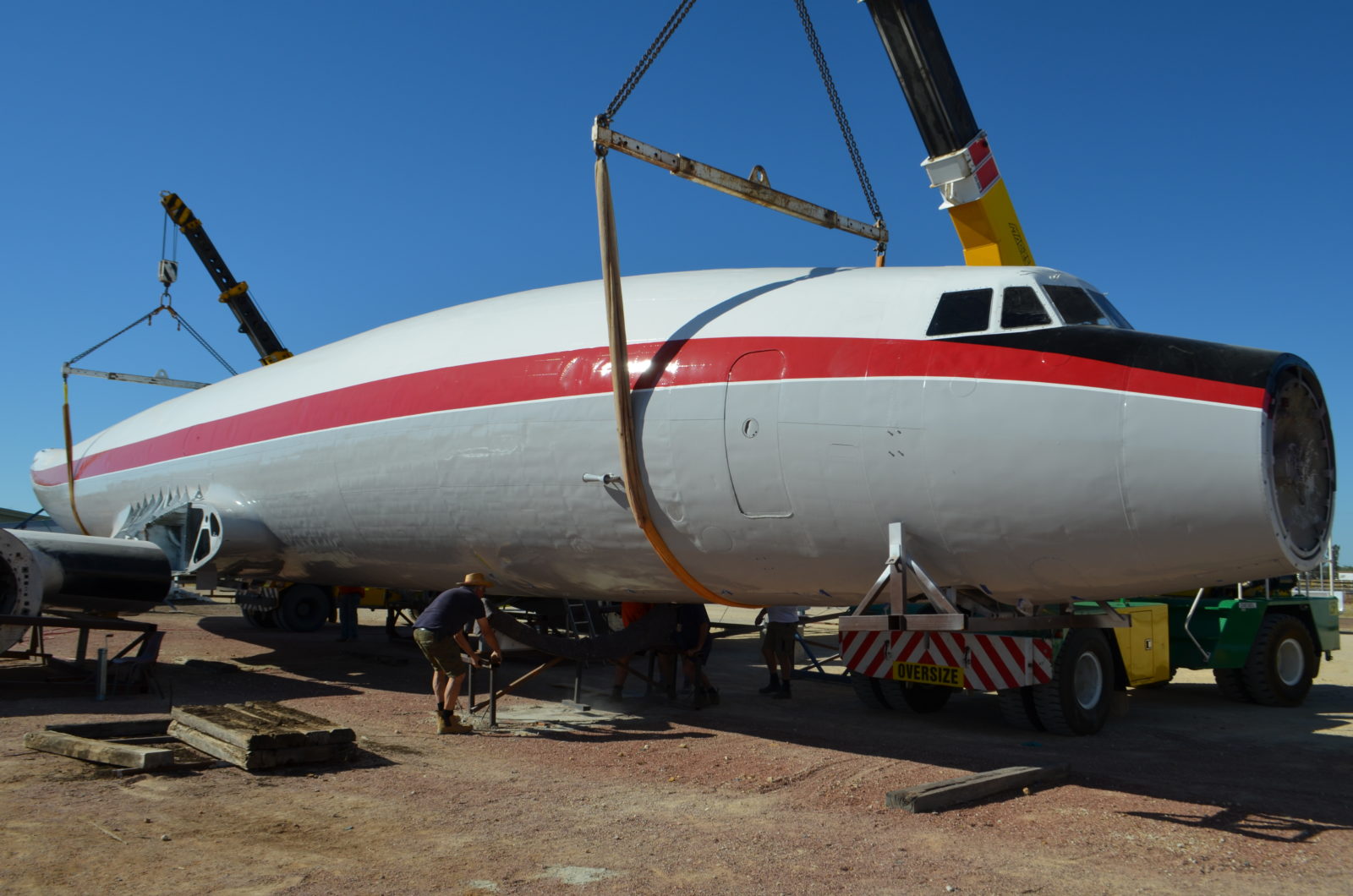 Lifting the fuselage onto stands in preparation for the wings to be attached