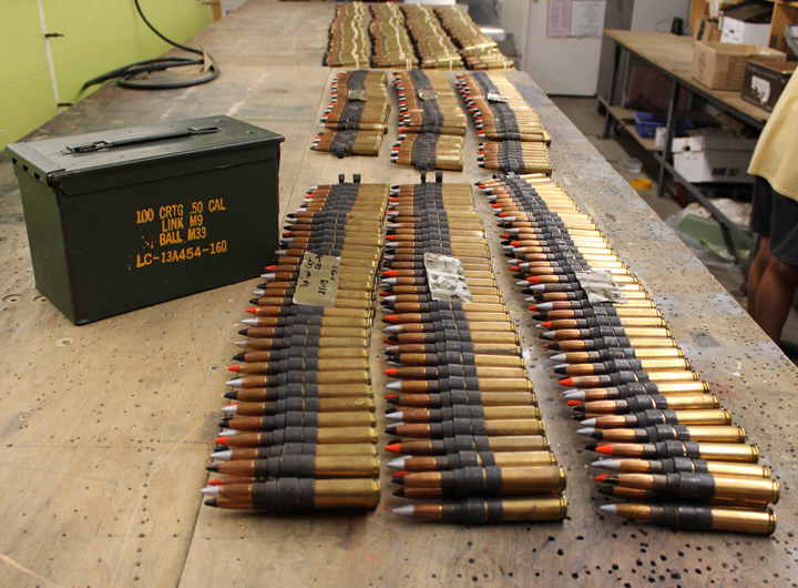 Linked .50 caliber cartridges and ammo box. (photo via Tom Reilly)