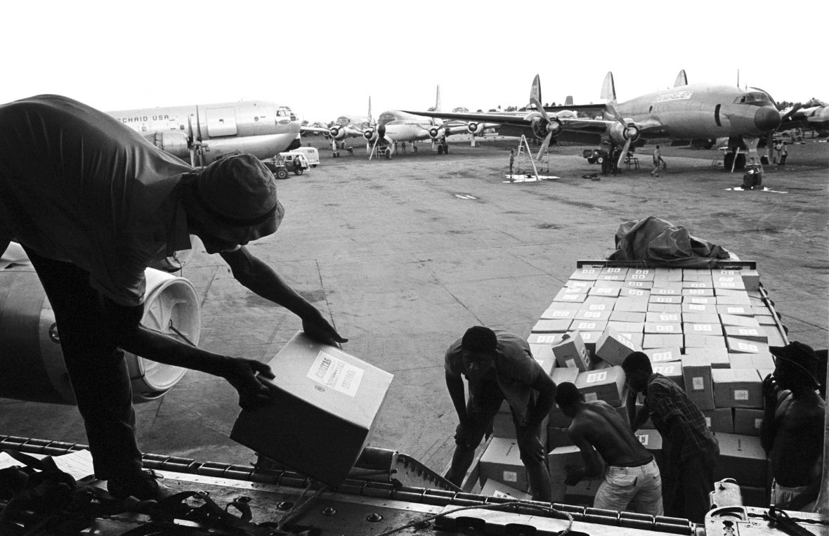 Loading of Joint Church Aid relief supplies on island of Sao Tome. Photo Peter Williams