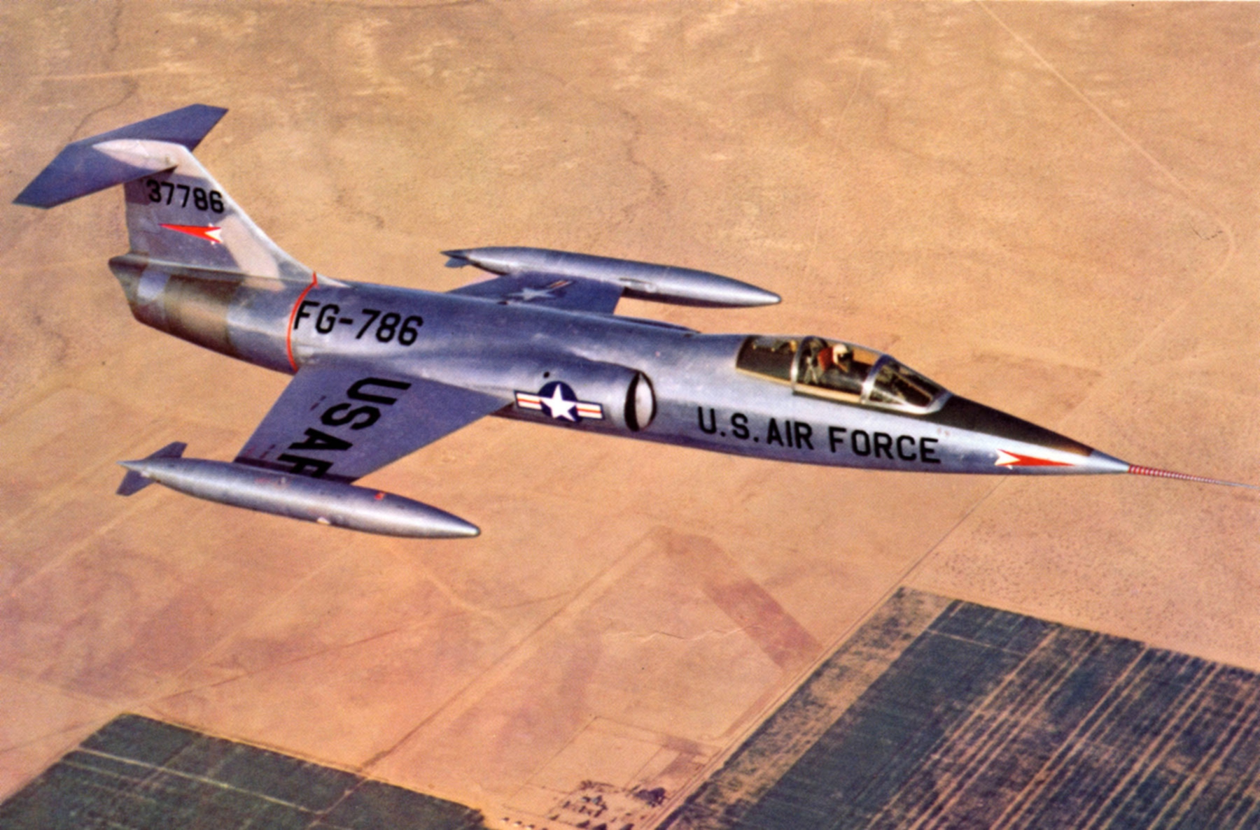 The first XF-104, serial number 53-7786, on a test flight near Edwards AFB. This aircraft crashed in 1957 following flutter problems which ripped the tail from the fuselage. The pilot, Bill Park, ejected safely. (image via Wikipedia)