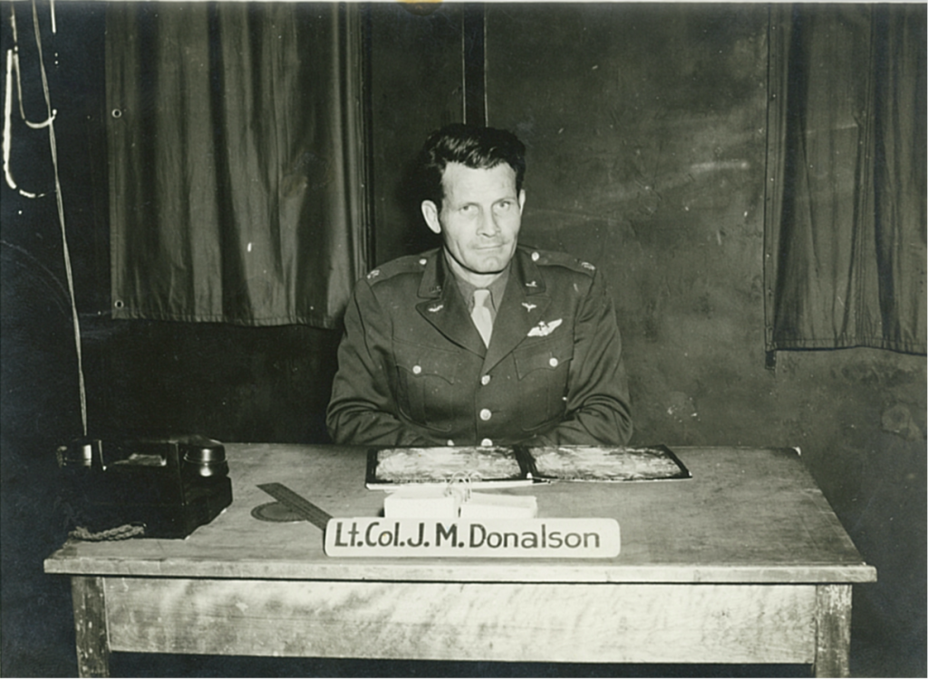 C-47 "That's All, Brother" - The Men Behind the Plane 14 Lt. Col. John M. Donalson at his Desk