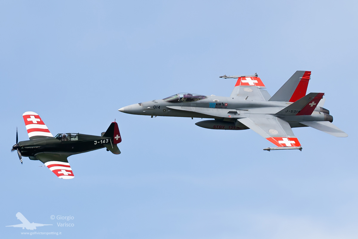 Old and new-ish... the world's only representative of a Morane Saulnier MS.406 in formation with a Swiss F/A-18. (photo by Giorgio Varisco) 