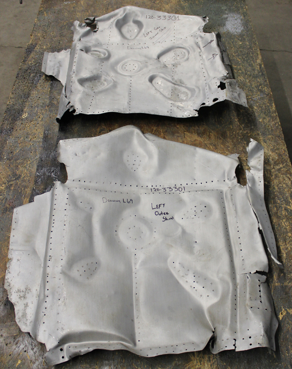 Template parts recovered from the mangled inboard gear doors. (photo via Tom Reilly)