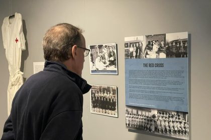 NASW Curator Chet Rietheimer viewing Camp Boardwalk while displayed at the Noyes Art Garage in Atlantic City