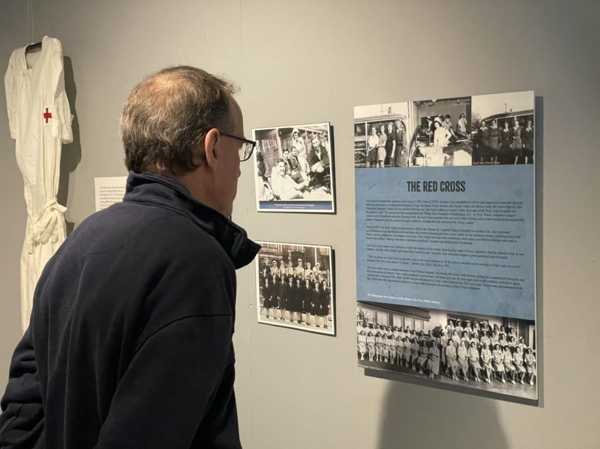 NASW Curator Chet Rietheimer viewing Camp Boardwalk while displayed at the Noyes Art Garage in Atlantic City