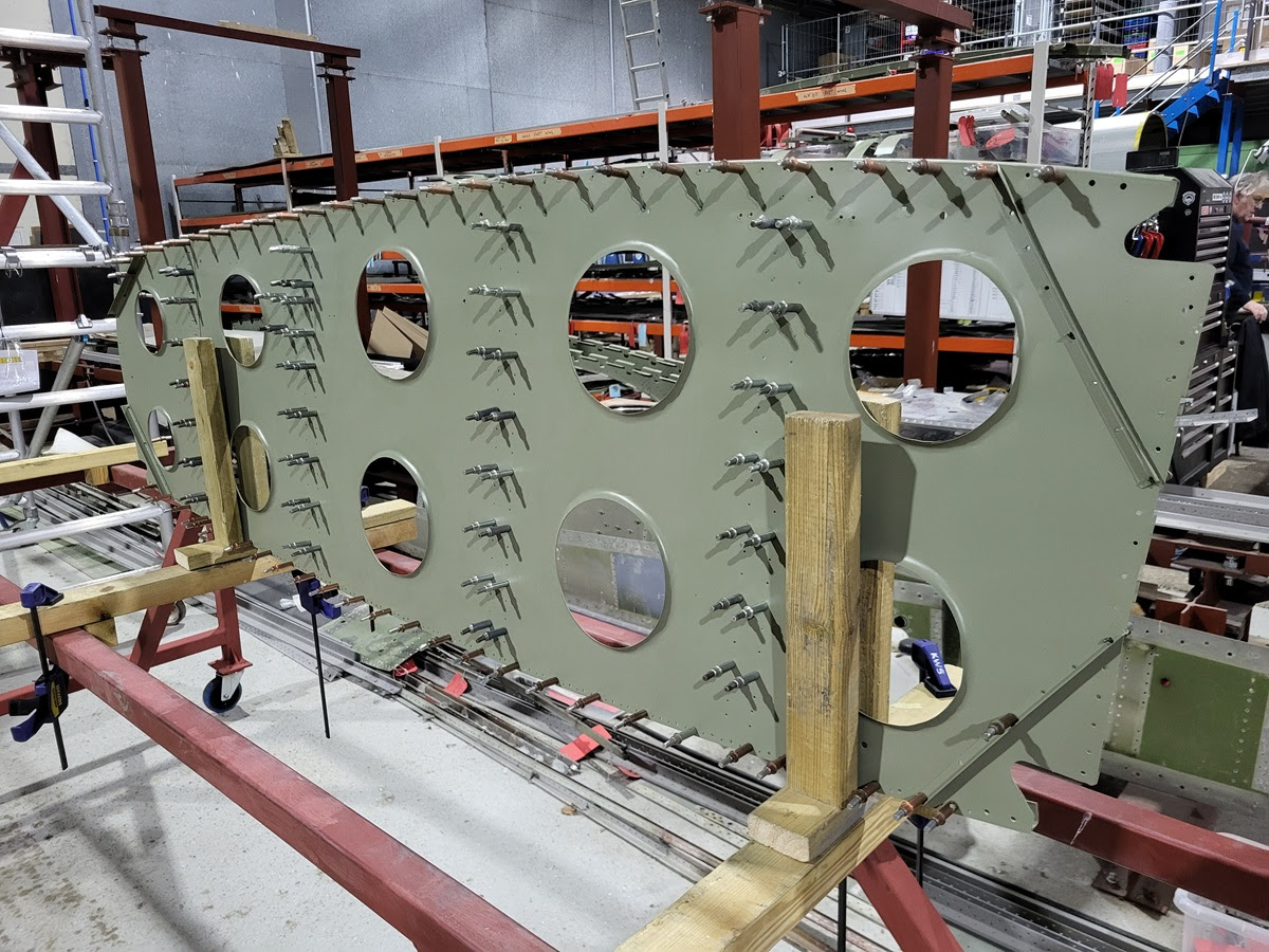Avro Lancaster B.VII NX611 ‘Just Jane’ – Restoration Update 255,256 and 257 11 NX611 port wing rib pinned for riveting