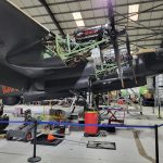 NX611 sat on jacks with her wheels removed for servicing and tyre replacement