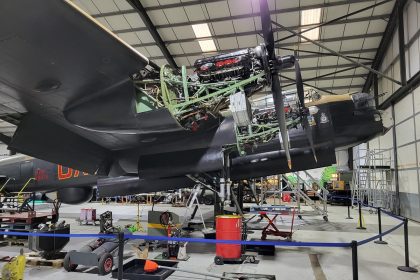 NX611 sat on jacks with her wheels removed for servicing and tyre replacement