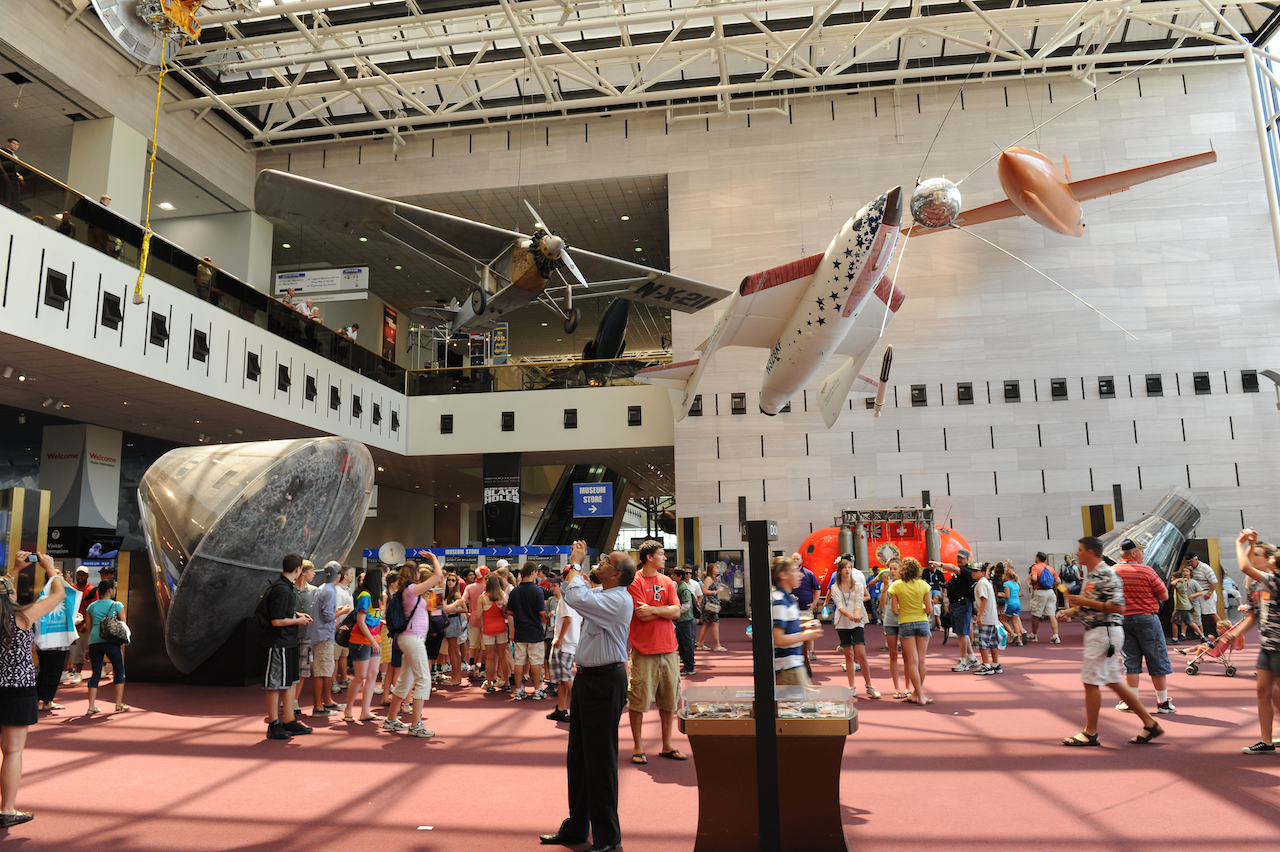 The entrance hall of the National Air and Space Museum in Washington, DC. Among the visible aircraft are Spirit of The St. Louis, the Apollo 11 command module, Space Ship One, and X-1. ( Image by r Jawed Karim)