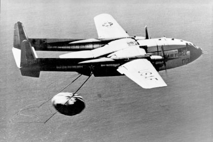 On August 19 1960 a USAF C 119J made the first midair recovery of a capsule returning from orbit