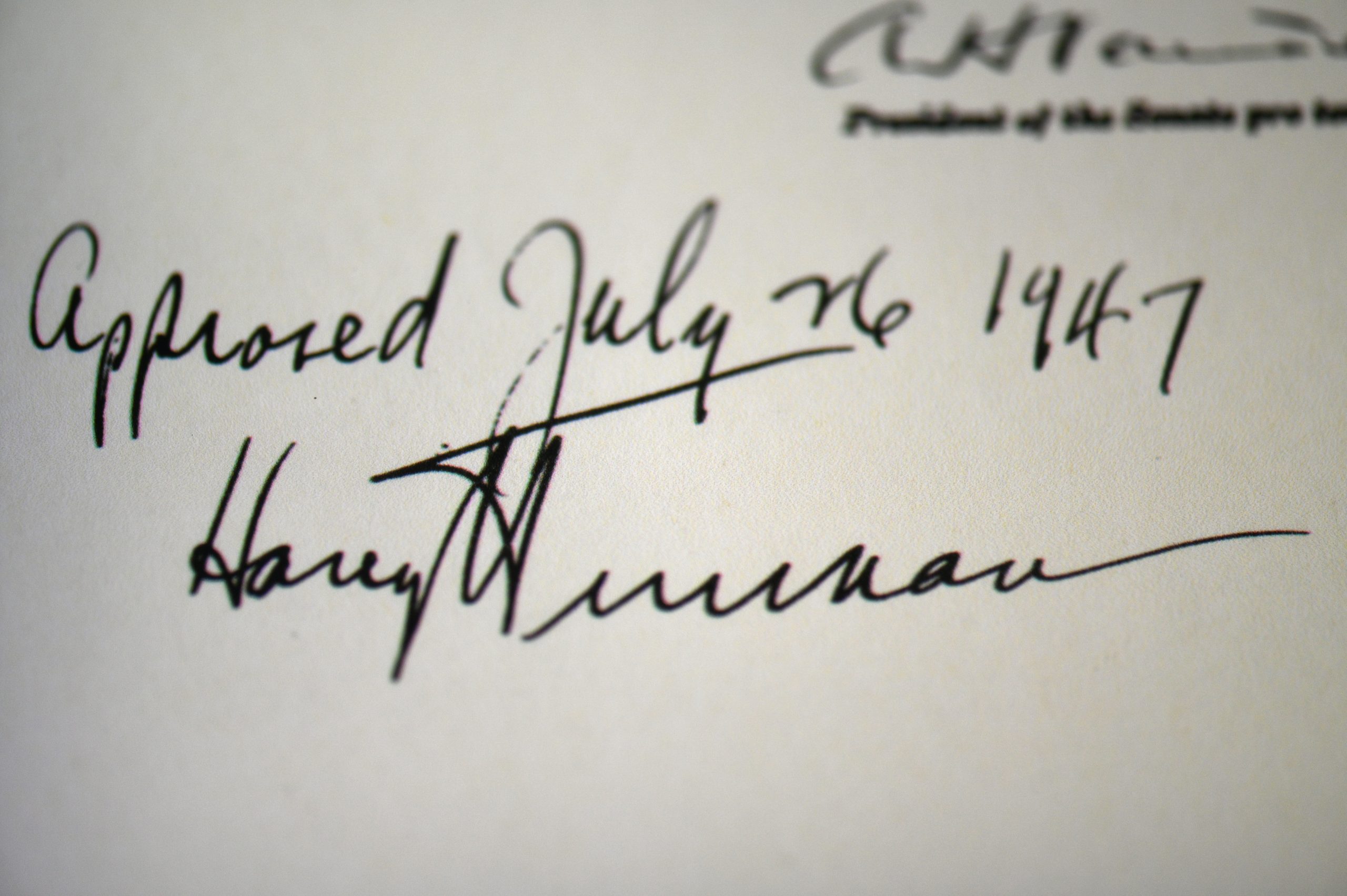 On July 26 1947 President Harry S. Truman used a pen on display to sign the National Security Act of 1947 while aboard the Douglas VC 54C Sacred Cow scaled