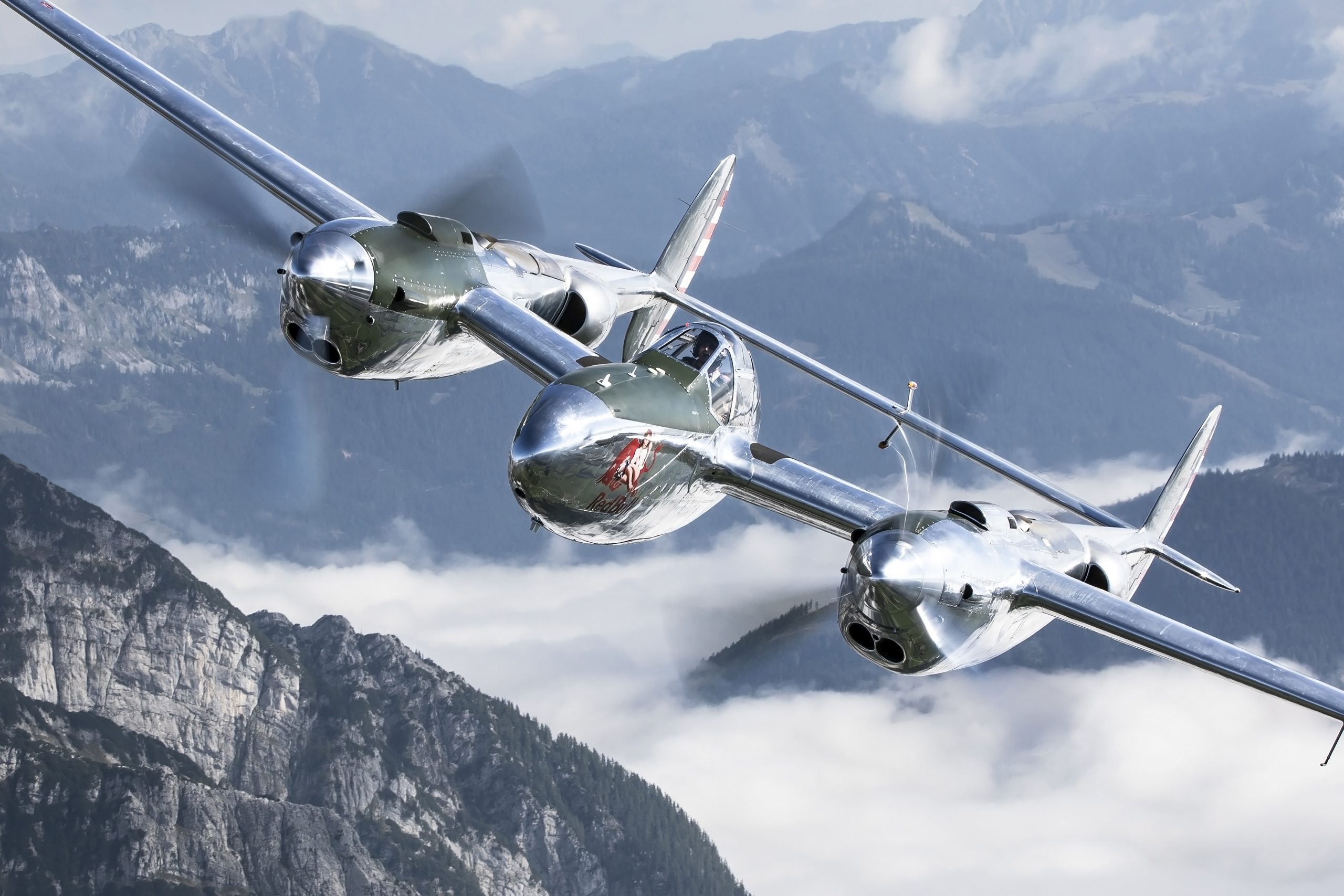 The Flying Bulls Bring P-38 Lightning and DC-6B at EAA AirVenture Oshkosh 2026 15 P 38 mountain flying on nose photo scaled