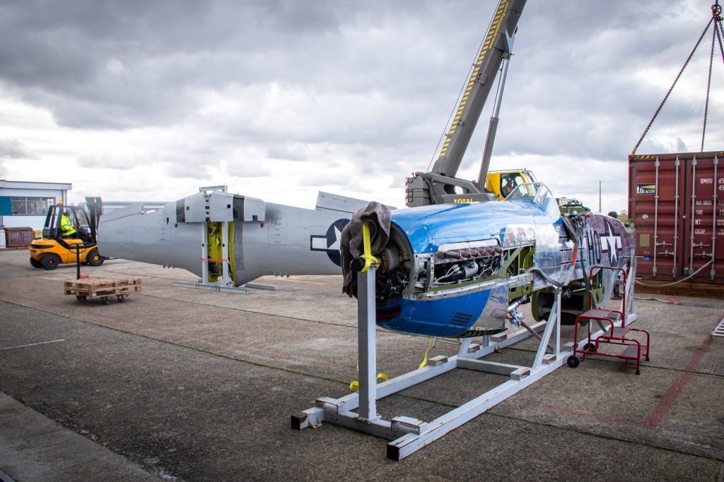 P 51D Mustang ‘Moonbeam McSwine Arrives at Biggin Hill Heritage Hangar 13